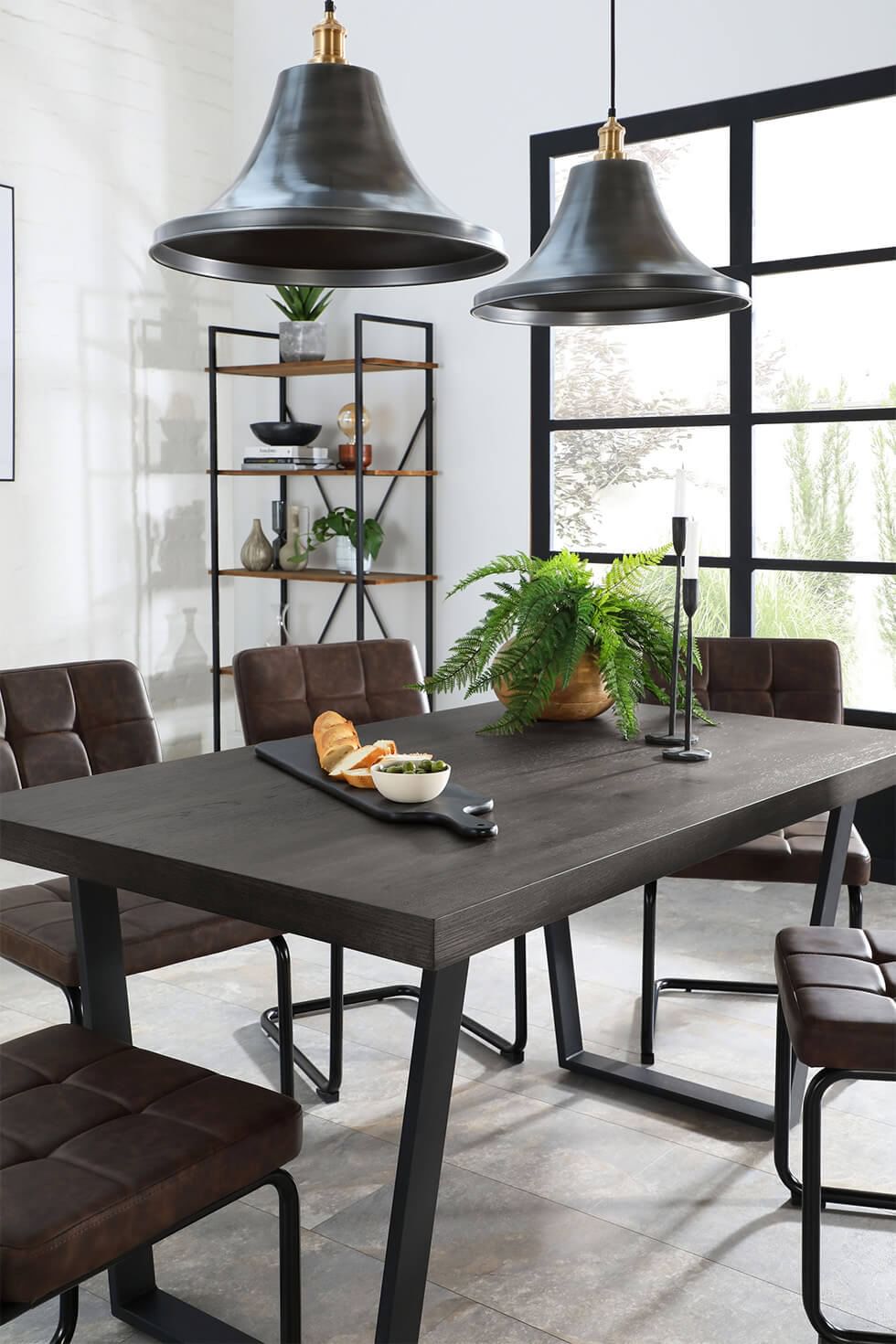 Monochrome dining room with a dark grey dining set