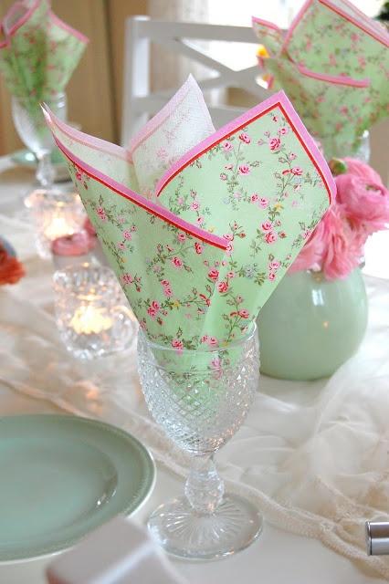 Floral napkins folded in glasses