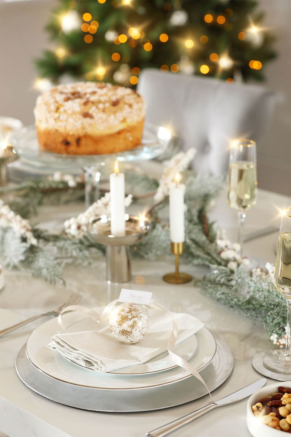 Table setting with Christmas baubles as decoration