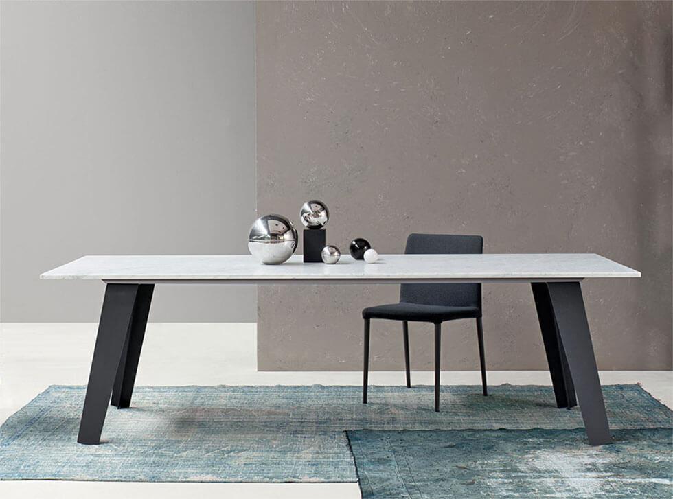 Marble dining table with minimalist accessories