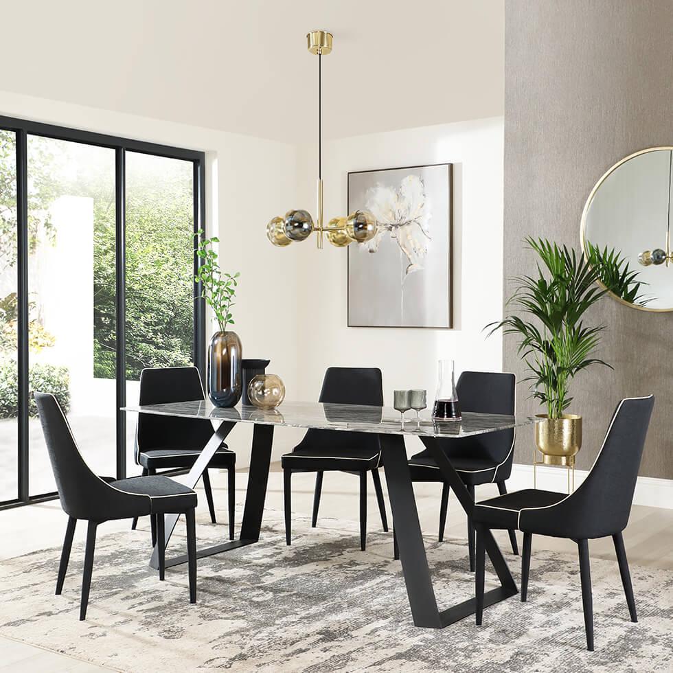 luxurious marble dining table and black fabric chairs in a modern dining space