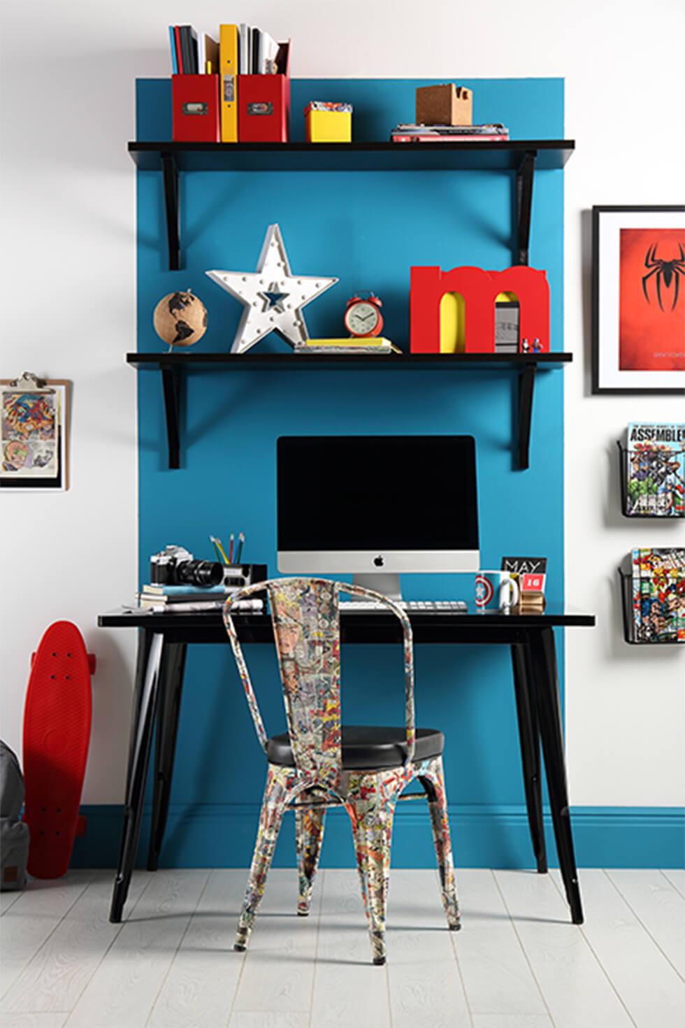 Home office with half-painted blue walls