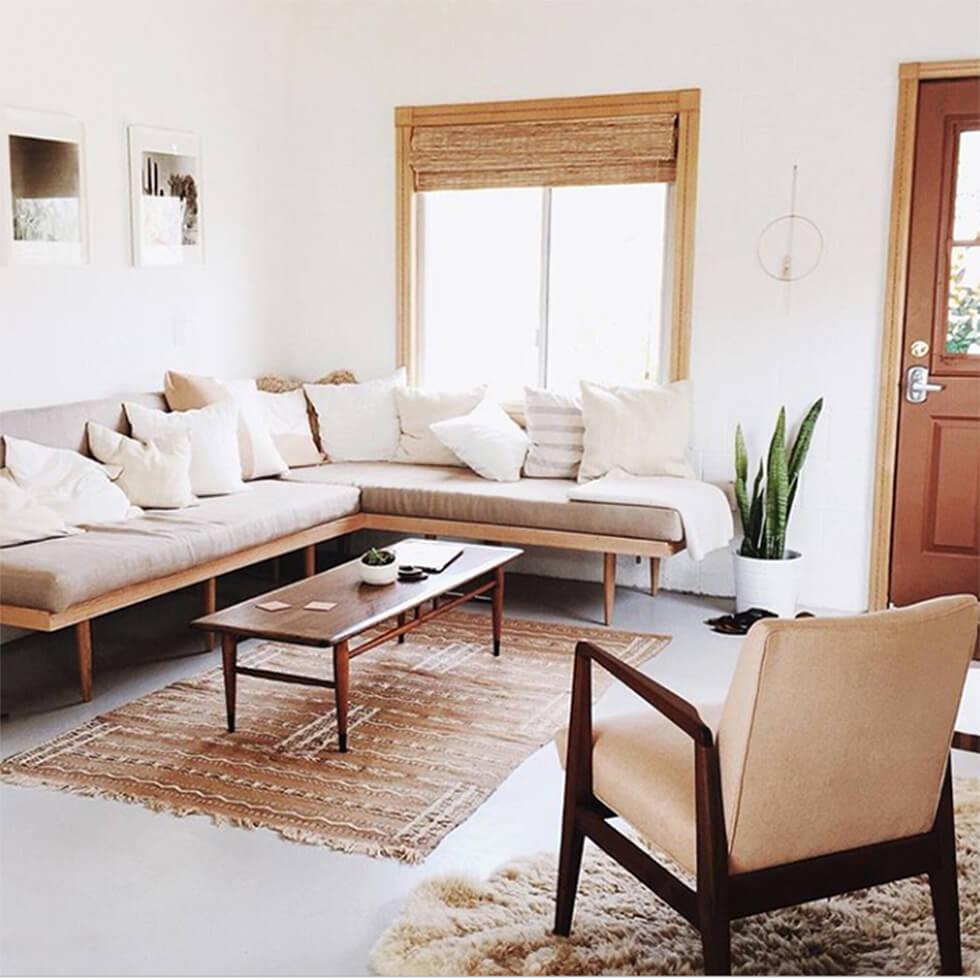 Beige corner sofa in a desert inspired living room.