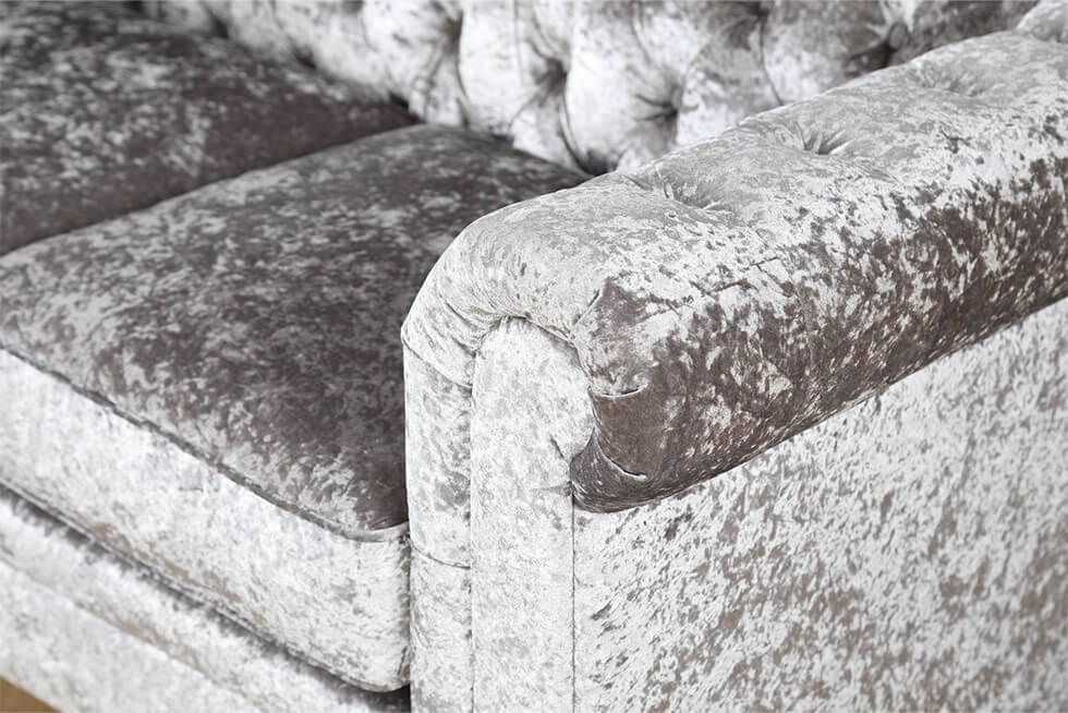 Close up of crushed velvet Chesterfield sofa