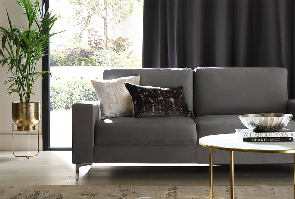 Grey velvet sofa in luxe living room