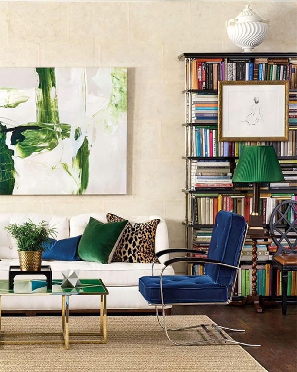 Sapphire blue and emerald green pops of colour in a neutral living room