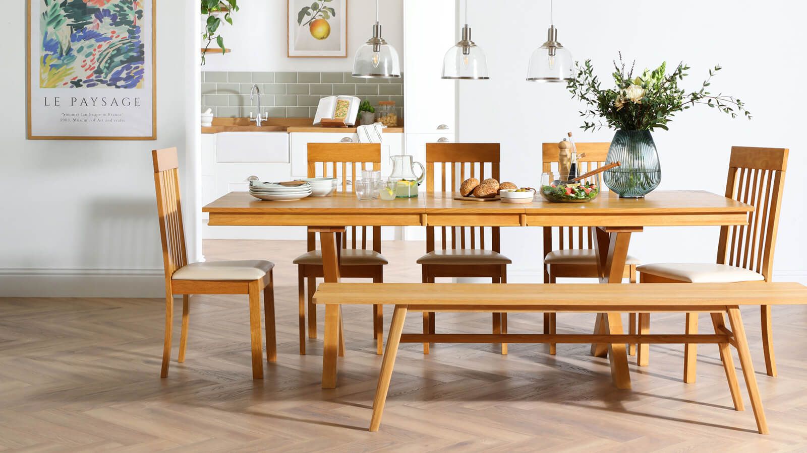Timeless wooden trestle dining set with chairs and bench in a kitchen-diner