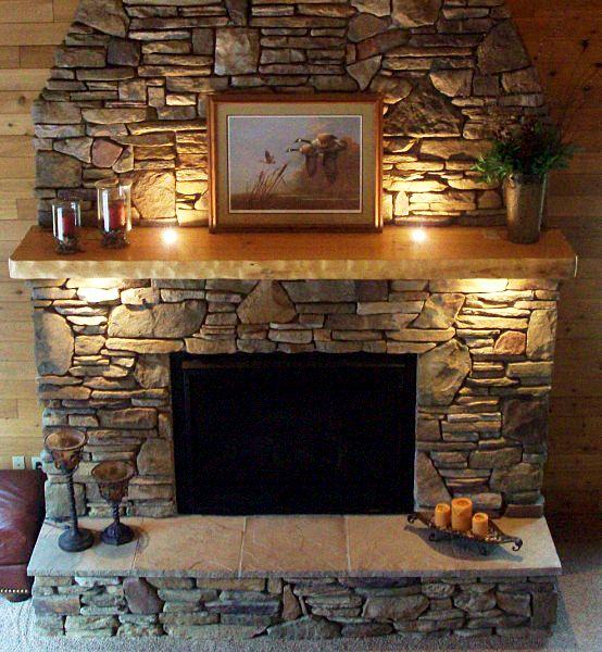 Stone fireplace with warm lighting