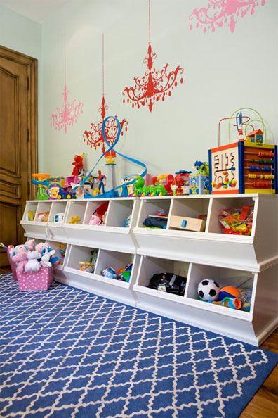 Childrens’ toys organised into cubbies