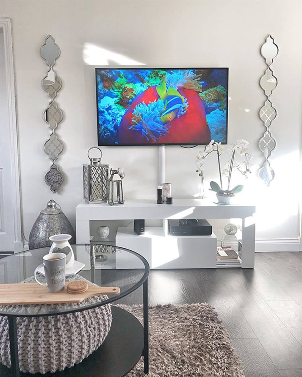 silver mirrors in a modern living room