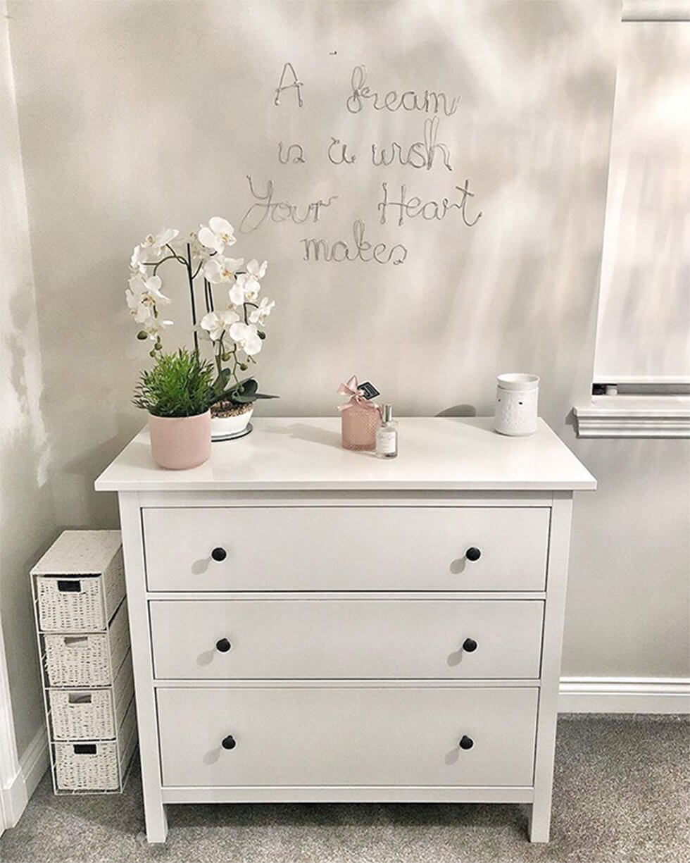 wire wording quote on bedroom wall