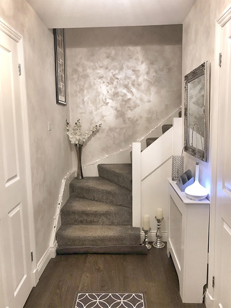 metallic silver painted walls on a modern stairway