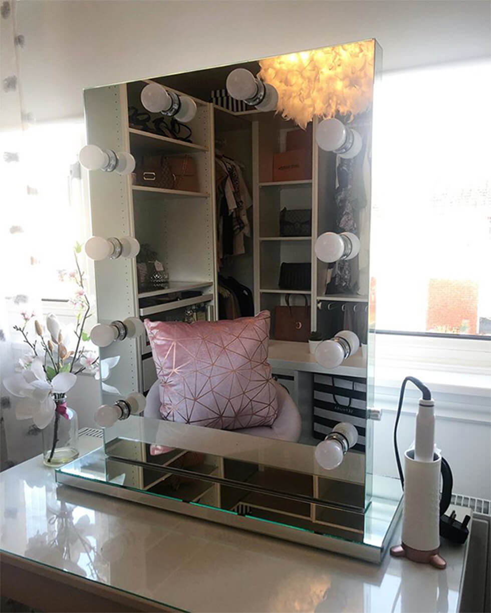 mirror with feature lights in a modern chic dressing room