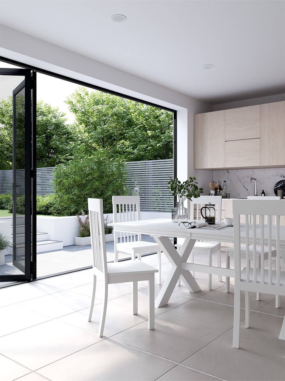 Open plan kitchen with all white dining set and full height glass door