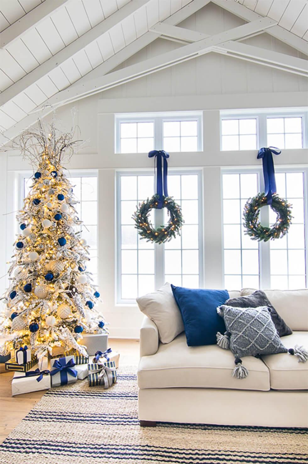 White Christmas living room with blue accents and decor