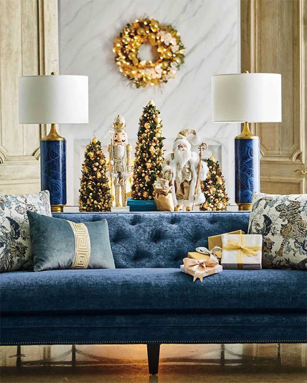 Blue and white living room with gold Christmas decor