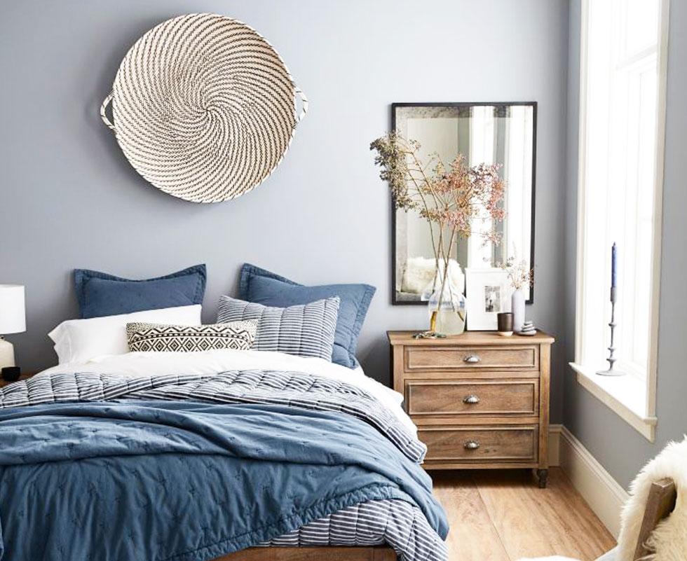 Blue and grey-themed bedroom.