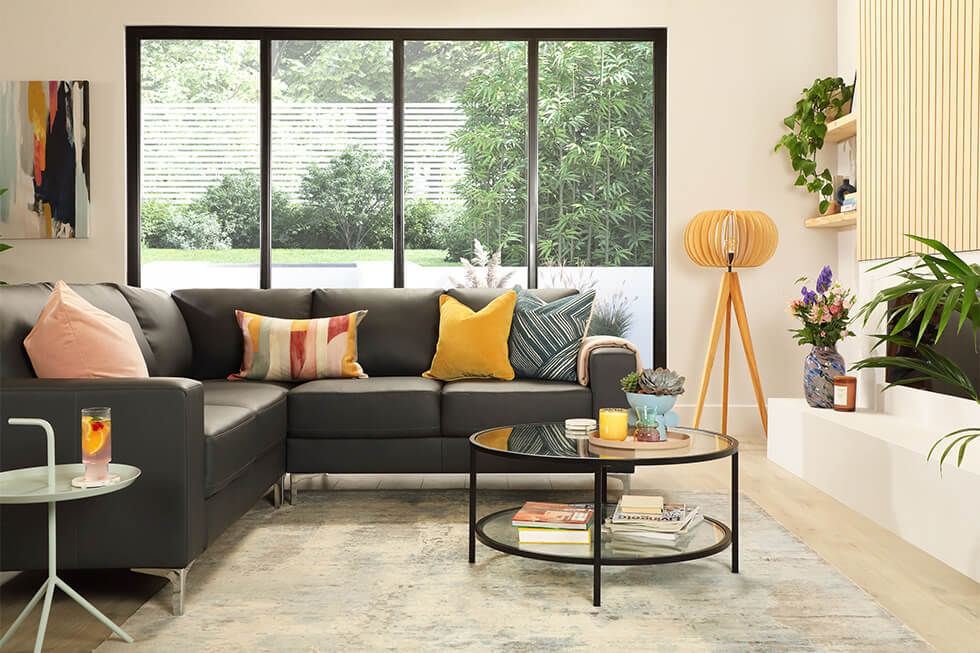 Modern neutral corner sofa in faux leather