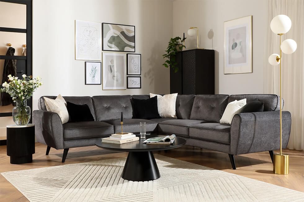 Contemporary grey velvet corner sofa in the living room