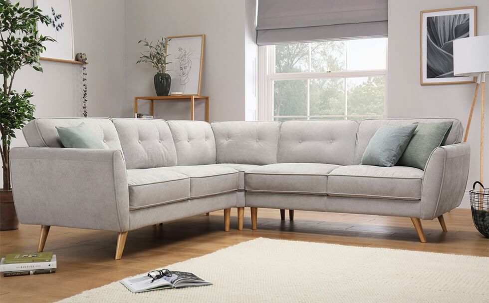 Light grey plush fabric sofa in a modern living room