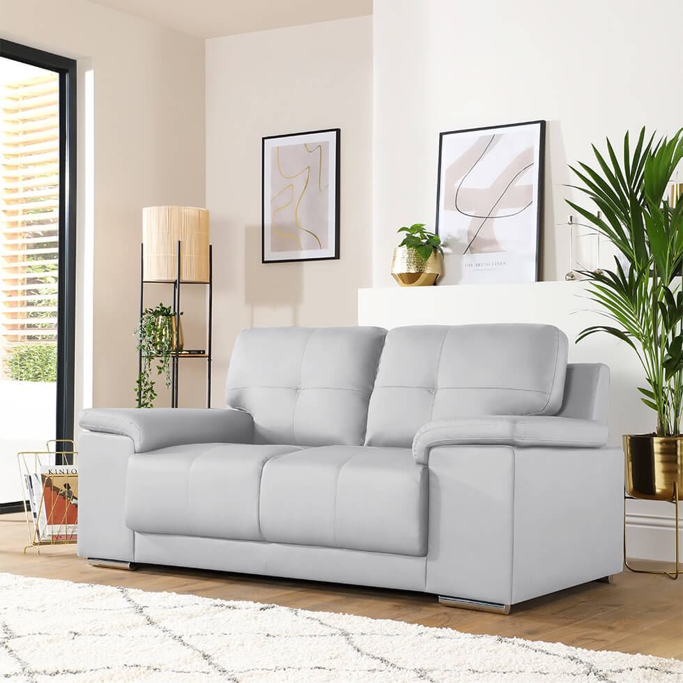 A stylish and comfortable light grey leather 3 seater sofa
