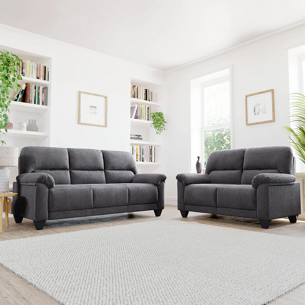 A comfy and compact 3+2 seater sofa set in dark grey dotted cord fabric