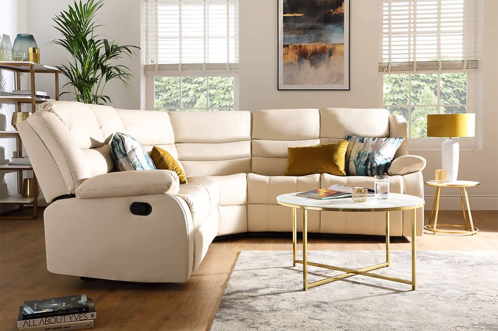 A comfortable recliner corner sofa with 2 reclining seats in chic ivory leather