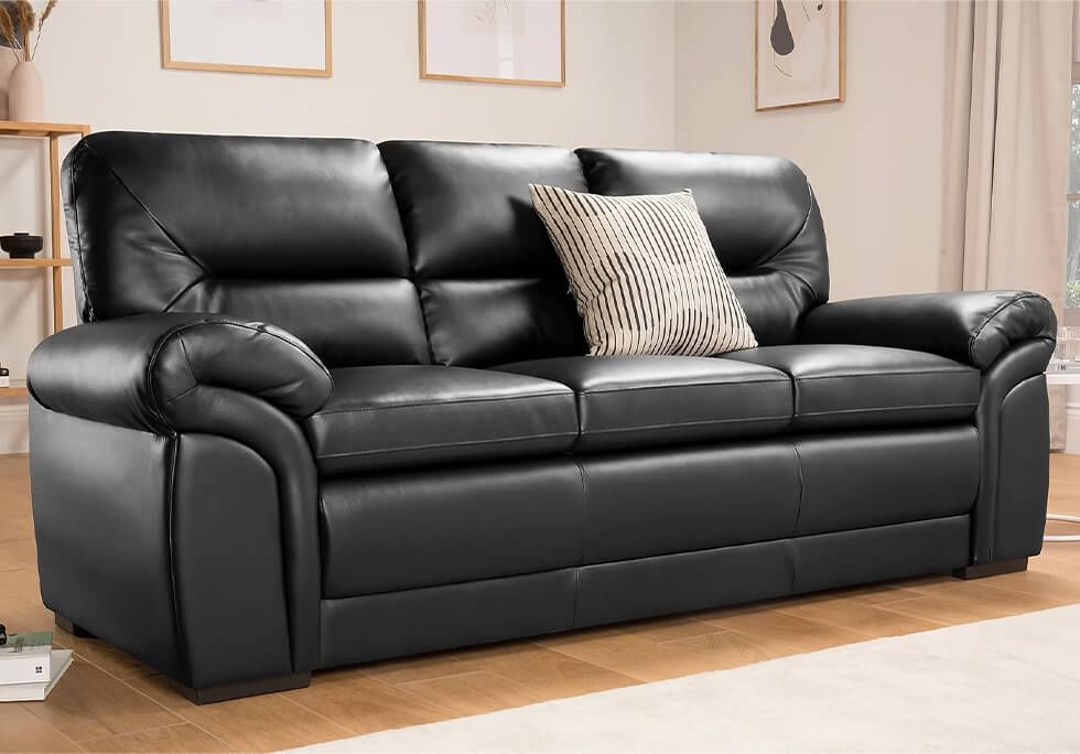 A stylish, comfy budget sofa in soft black leather upholstery
