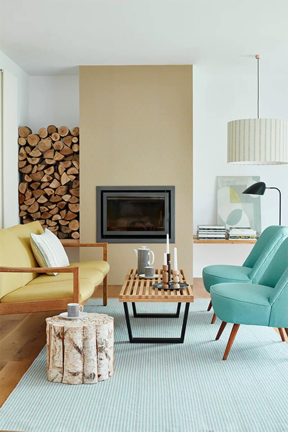 Minimal mid-century living room with yellow sofa and teal armchairs