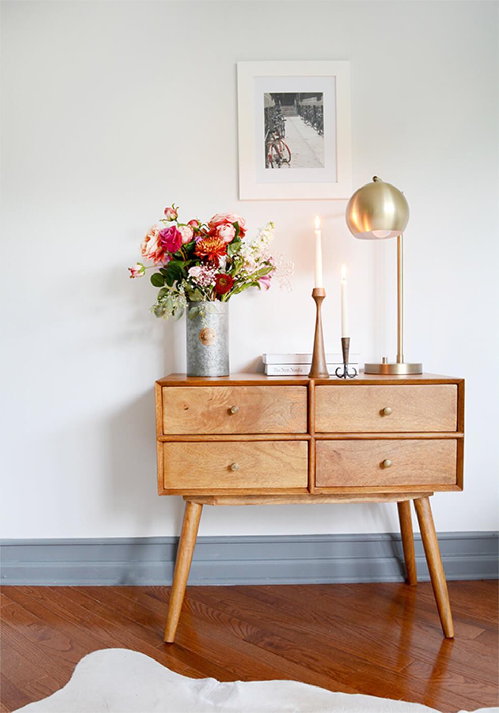 Mid-century chest of drawers with statement domed brass lamp