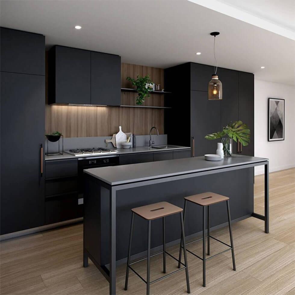 Matte black kitchen with contrasting white walls and wooden flooring