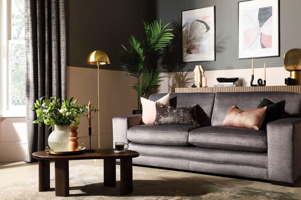 Two-toned walls in a pink and grey living room