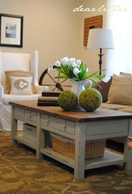 Baskets stored under coffee table. 