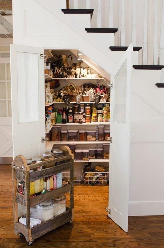 Pantry under the stairs. 
