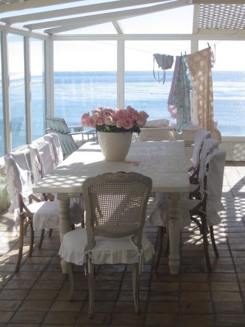 Dining area with plenty of full length windows.