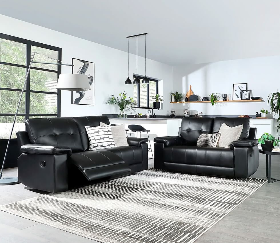 Black sofa recliner set in minimalist black and white living room