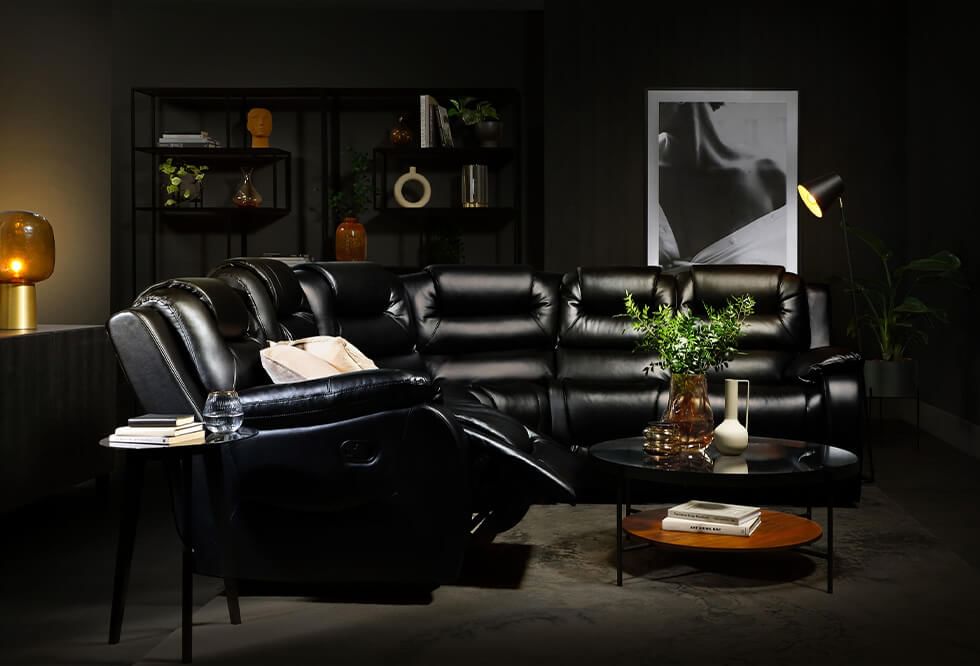 Black corner recliner sofa in home cinema