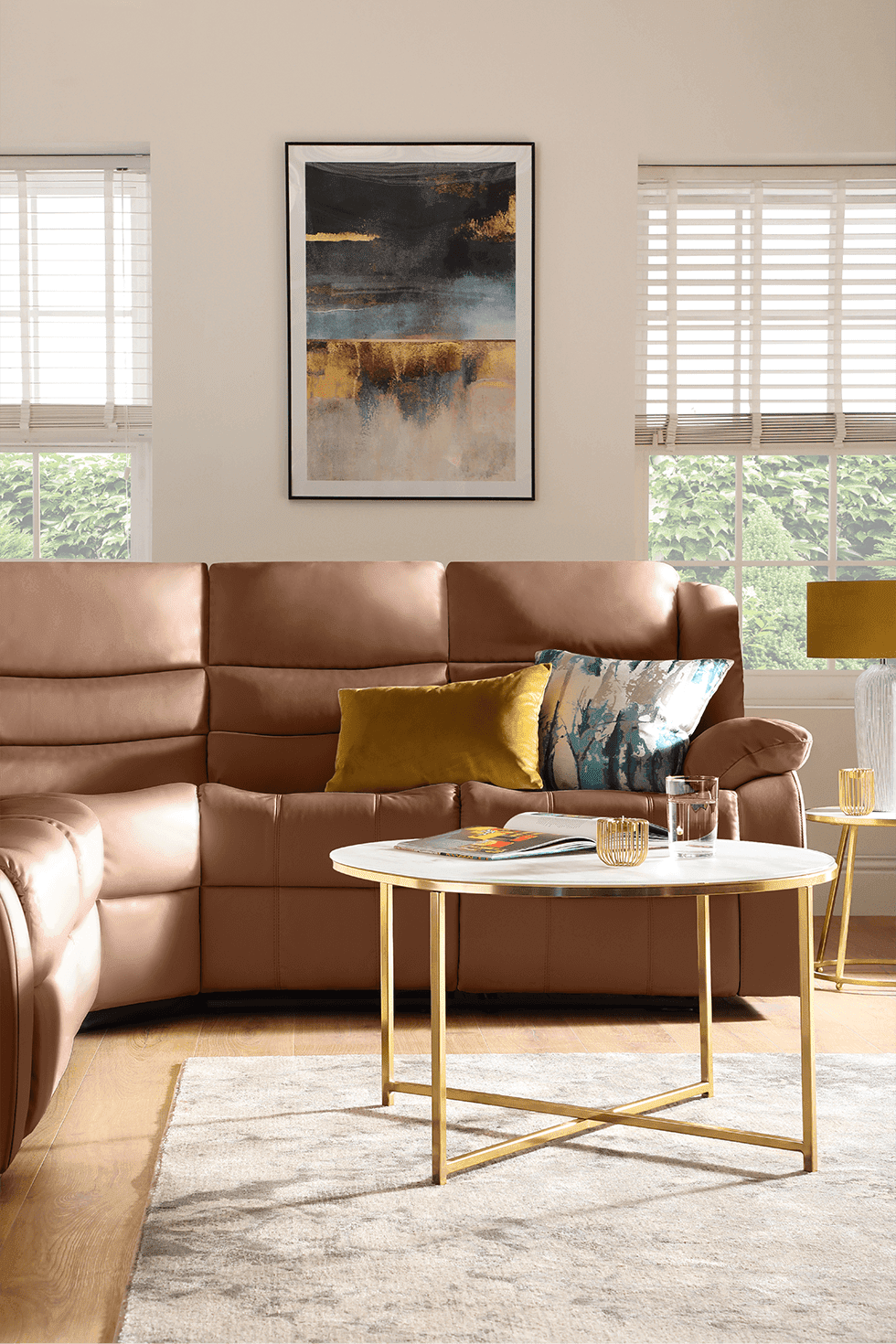 A stylish brown leather sofa with yellow decor