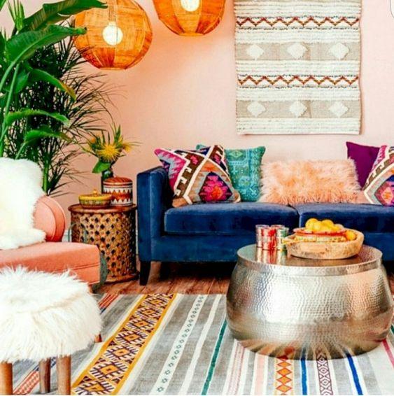 Moroccan style living room with colourful patterned rugs and kilim cushions.